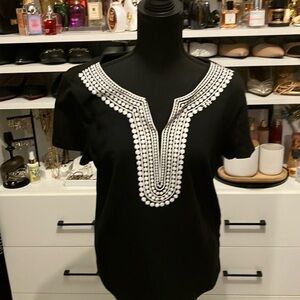 Women’s size medium  short sleeve Tommy Hilfiger black and white t-shirt.